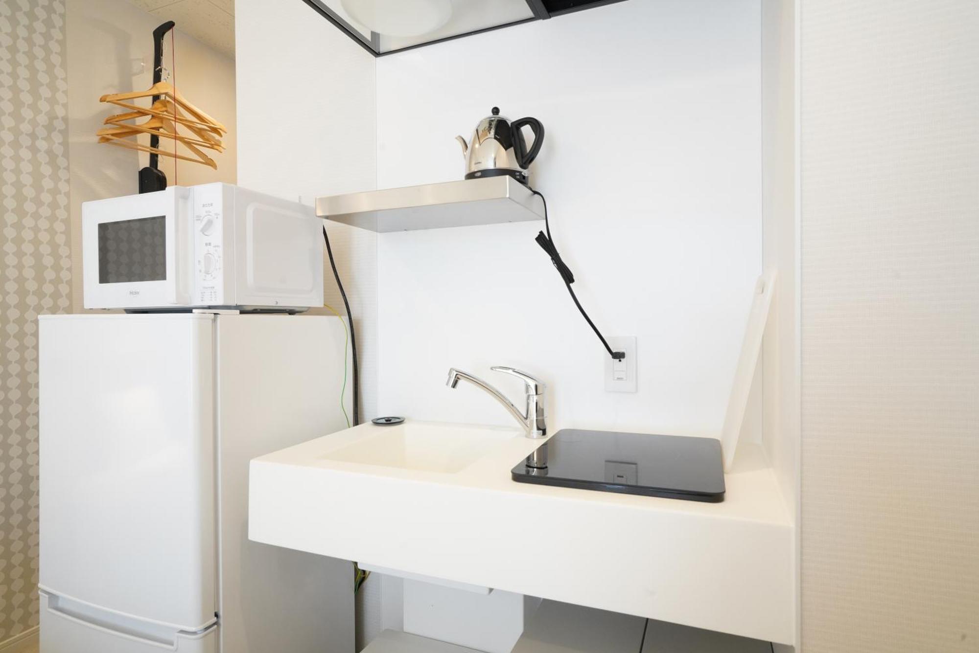 U-Hotel Takadanobaba Токио Стая снимка